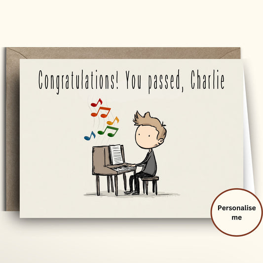 Greeting card with a cartoon illustration of a person sitting at a piano, with text 'Congratulations! You passed, Charlie'.