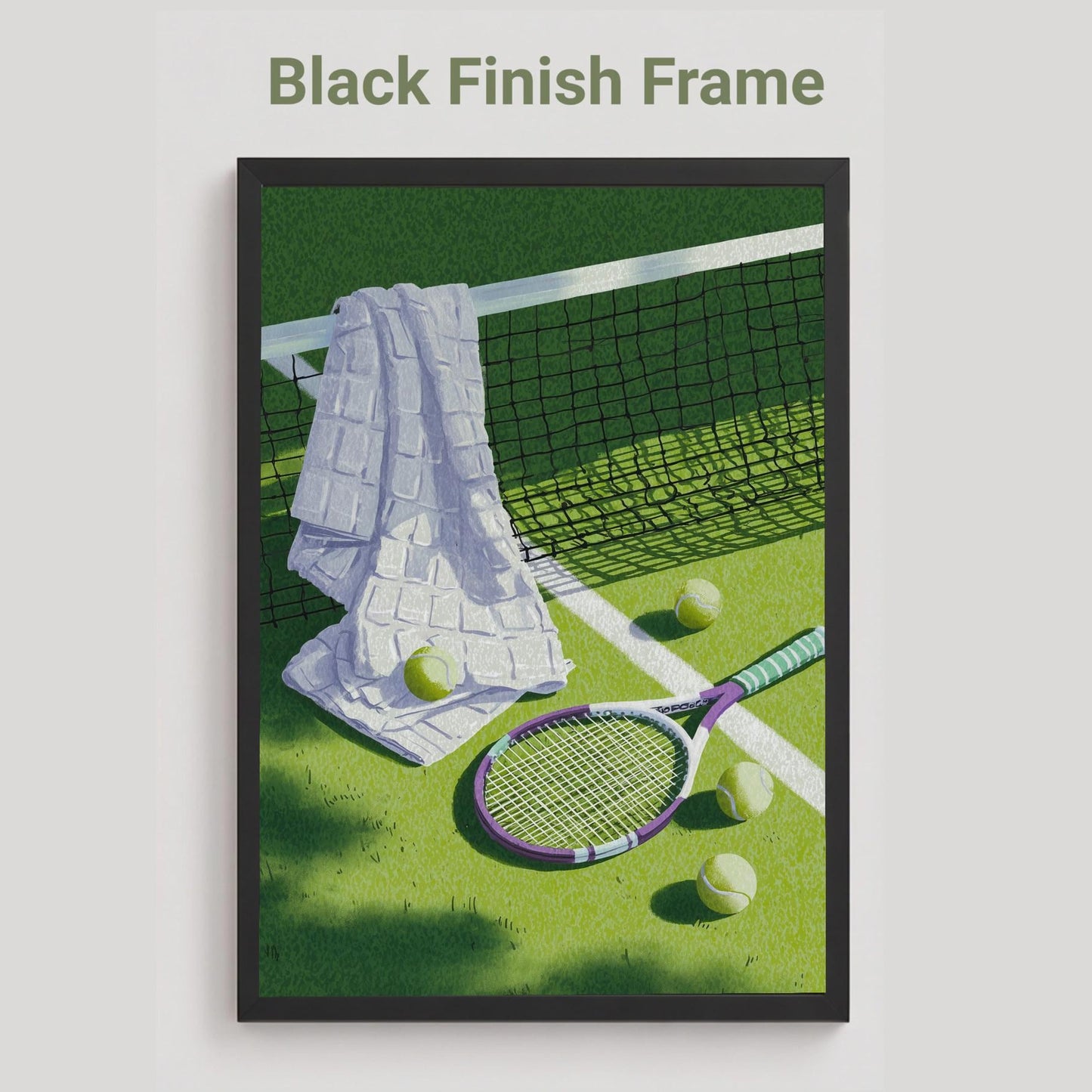 A black finish framed tennis-themed art print on a light gray background. The print shows a green tennis court with a white towel draped over the net, tennis balls, and a racket. Vintage tennis racket, towel and balls resting on a grass court, retro lilac and sage tennis wall art print
