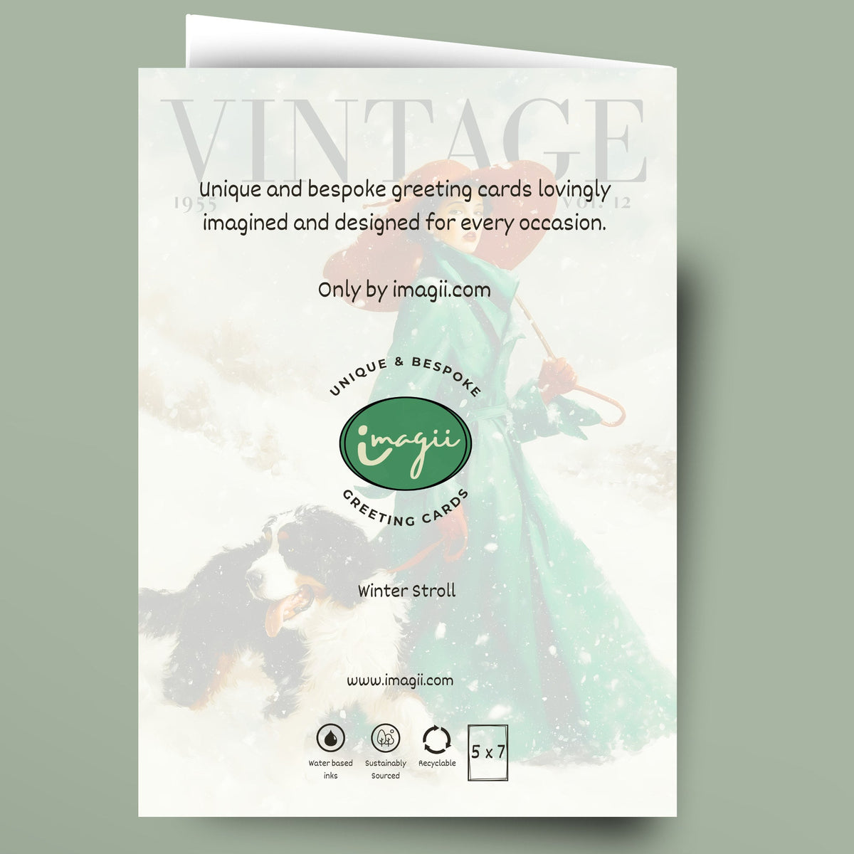 A greeting card mockup shown against a muted sage green background. The card features a vintage-style winter illustration with a woman in a flowing mint dress and a dog, overlaid with text including 'Vintage', 'Unique and bespoke greeting cards lovingly imagined and designed for every occasion.