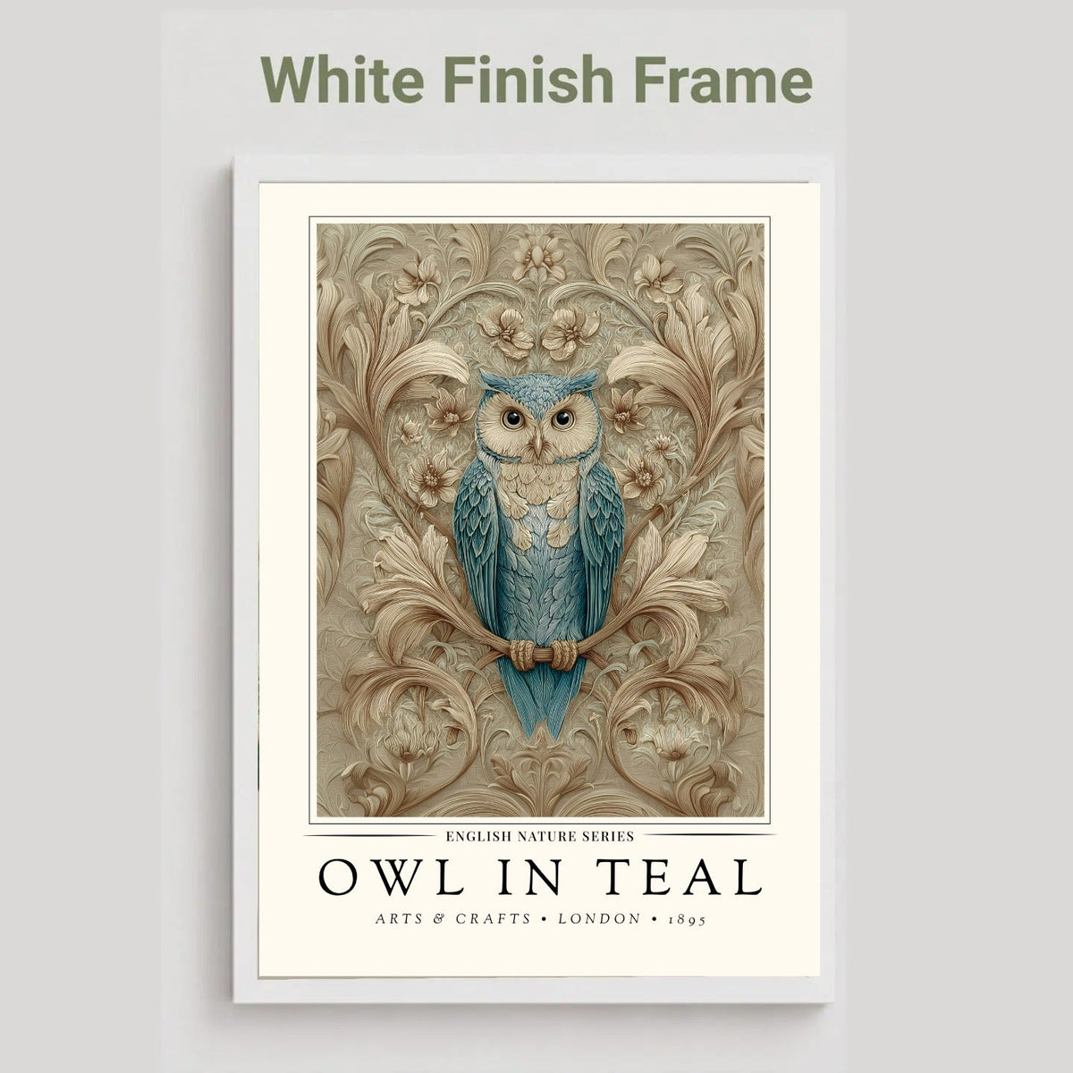 A framed art print featuring a blue owl perched on a branch with ornate beige foliage, shown against a light gray background. The top of the image includes the text 'White Finish Frame' above the frame.