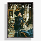 A framed vintage magazine cover featuring a woman in a dark blue dress and wide-brimmed hat beside a leopard in an ornate interior. The cover prominently displays the word 'VINTAGE' at the top.