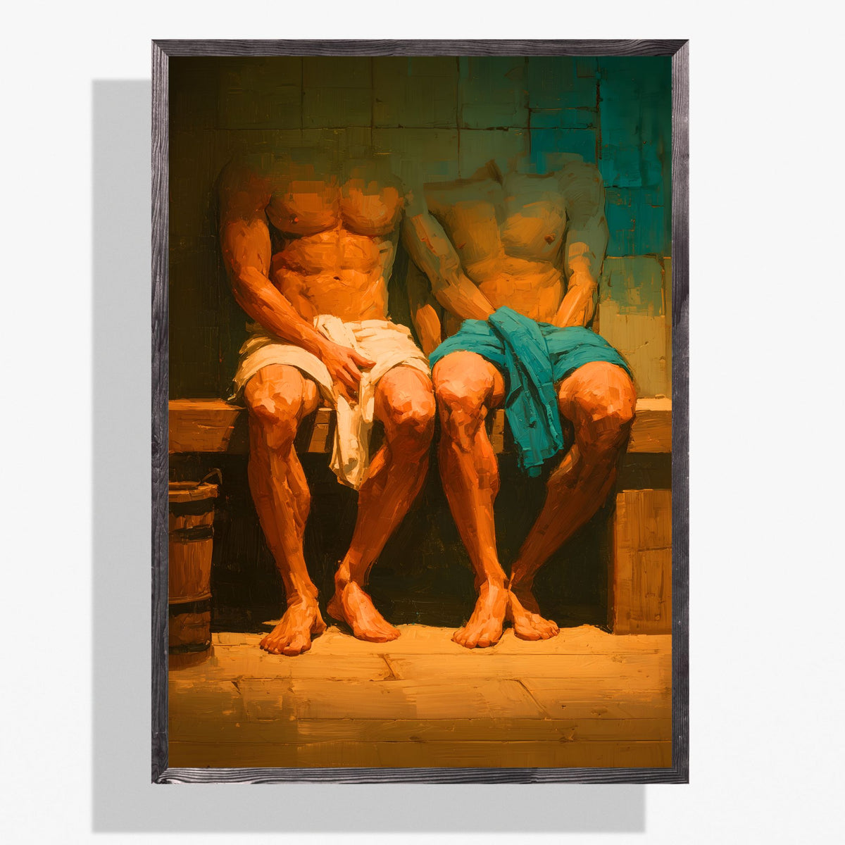 A framed art print depicting two shirtless men sitting on a bench wrapped in white and teal cloths, set against a warm yellow-orange glow, shown on a light gray background.