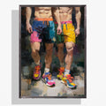 Two of a Kind gay couple art print in a dark wood frame, two muscular men side by side in colour-block and yellow shorts with bright running trainers
