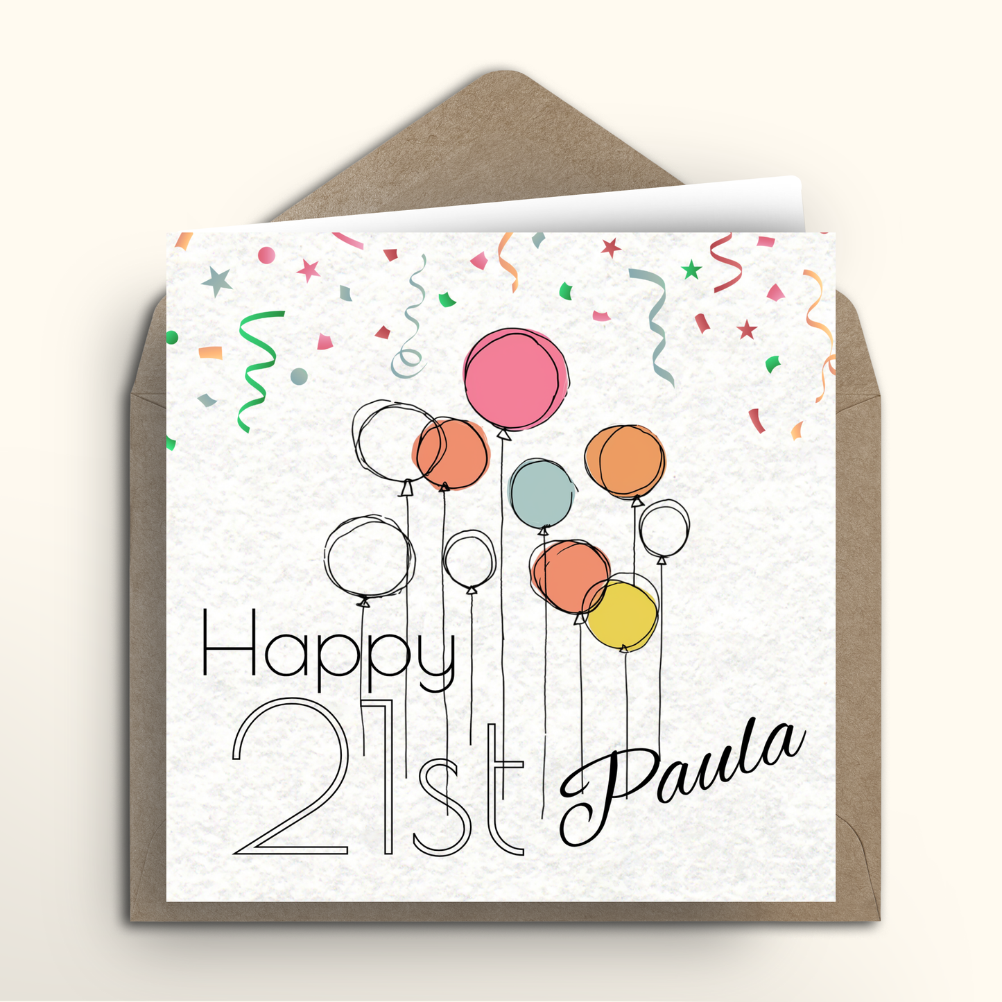 Greeting card with colorful balloons and 'Happy 21st Paula' text on a white background with a brown envelope.