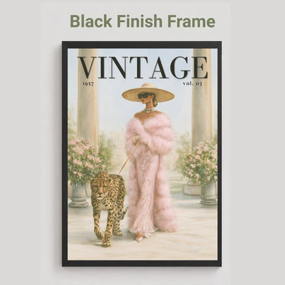 A framed vintage-style art print featuring a woman in a pink fur coat walking a leopard, with the word 'VINTAGE' across the top. The print is shown in a black finish frame against a light gray background, with the text 'Black Finish Frame' above it.