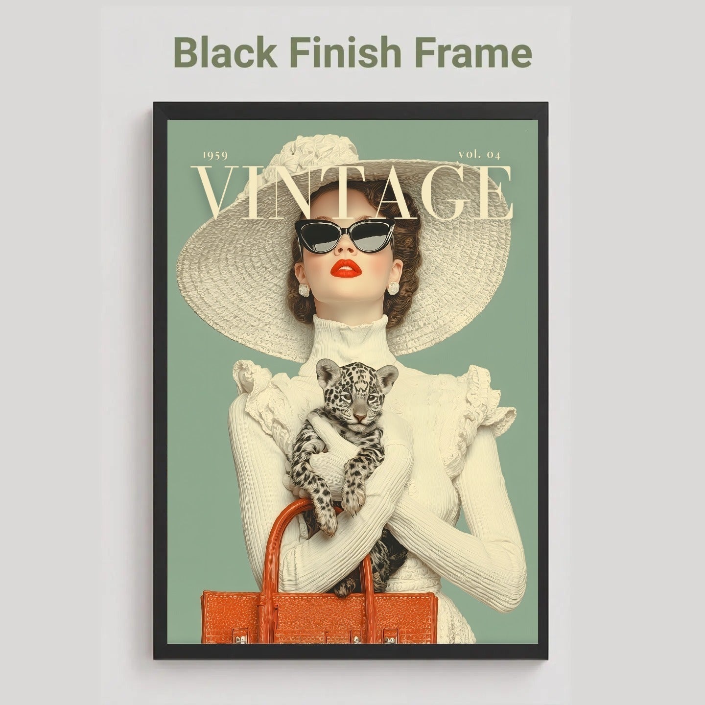 A framed vintage-style art print featuring a woman in a large hat and sunglasses holding a leopard cub, with the word 'VINTAGE' across the top. The print is shown in a black frame against a light gray background, with the text 'Black Finish Frame' above it.