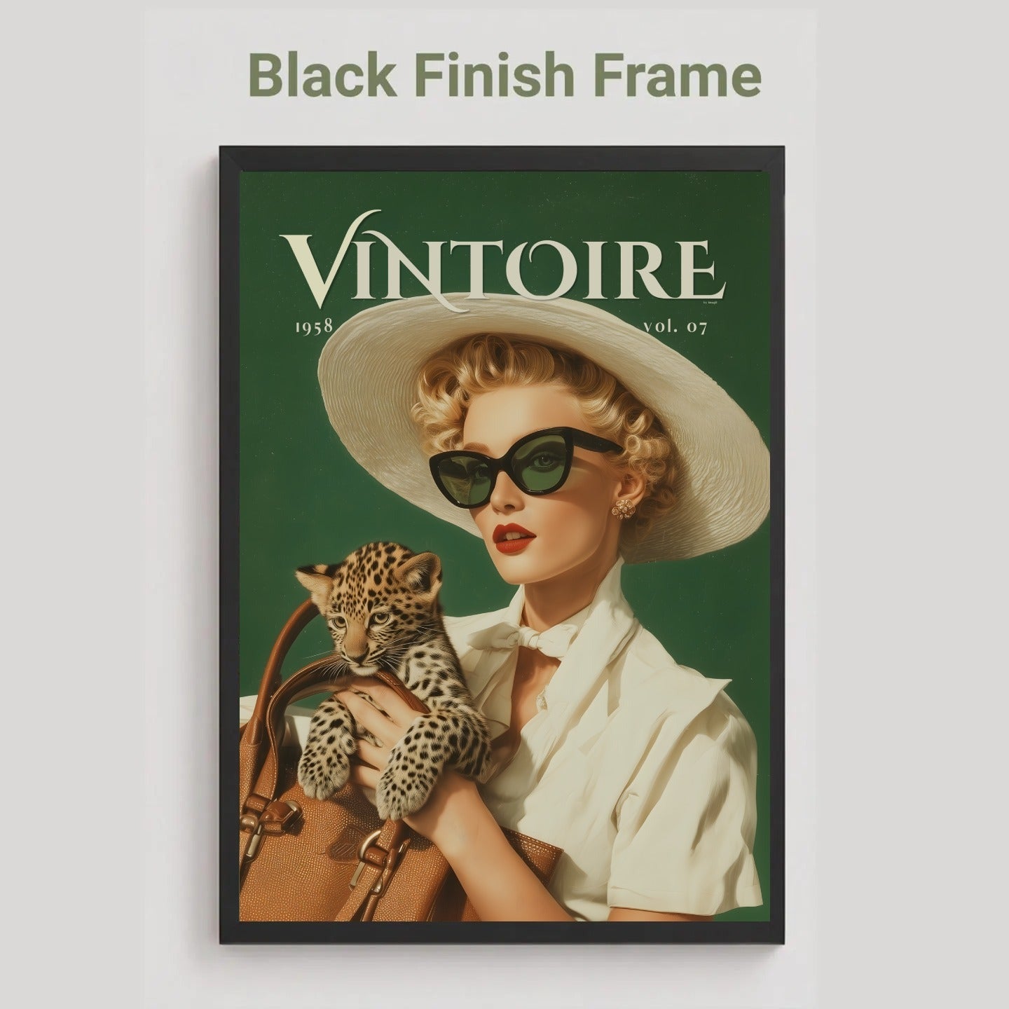 A black framed vintage-style poster or magazine cover featuring a woman in a wide-brim hat and sunglasses holding a leopard, with the title 'VINTOIRE' at the top. The frame is black, and the image is shown against a light gray background with the text 'Black Finish Frame' above it. Retro leopard wall art poster: 1950s woman in cat-eye sunglasses holding a leopard cub, green vintage print for maximalist decor