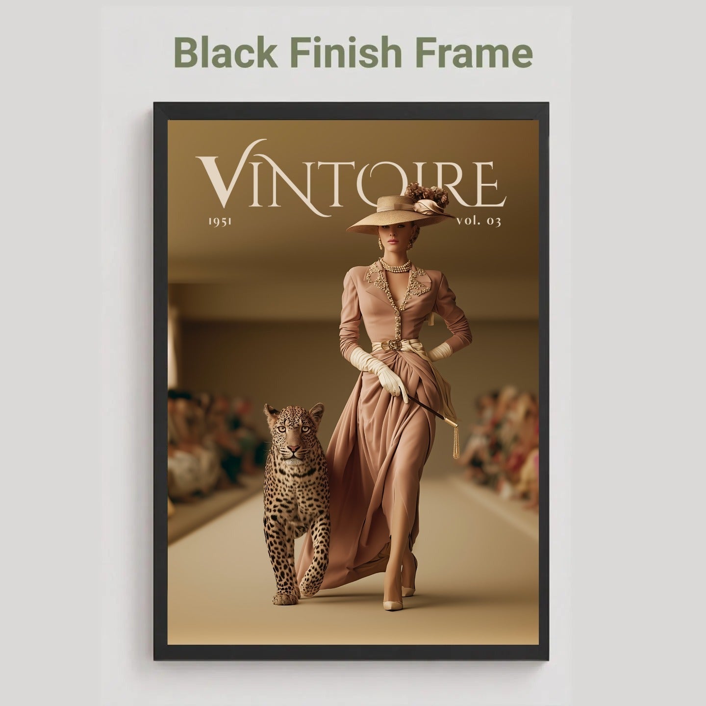 A framed fashion poster titled 'VINTOIRE' showing a woman in a long beige dress walking with a leopard on a runway, presented in a black frame against a light gray background with the text 'Black Finish Frame' above.
