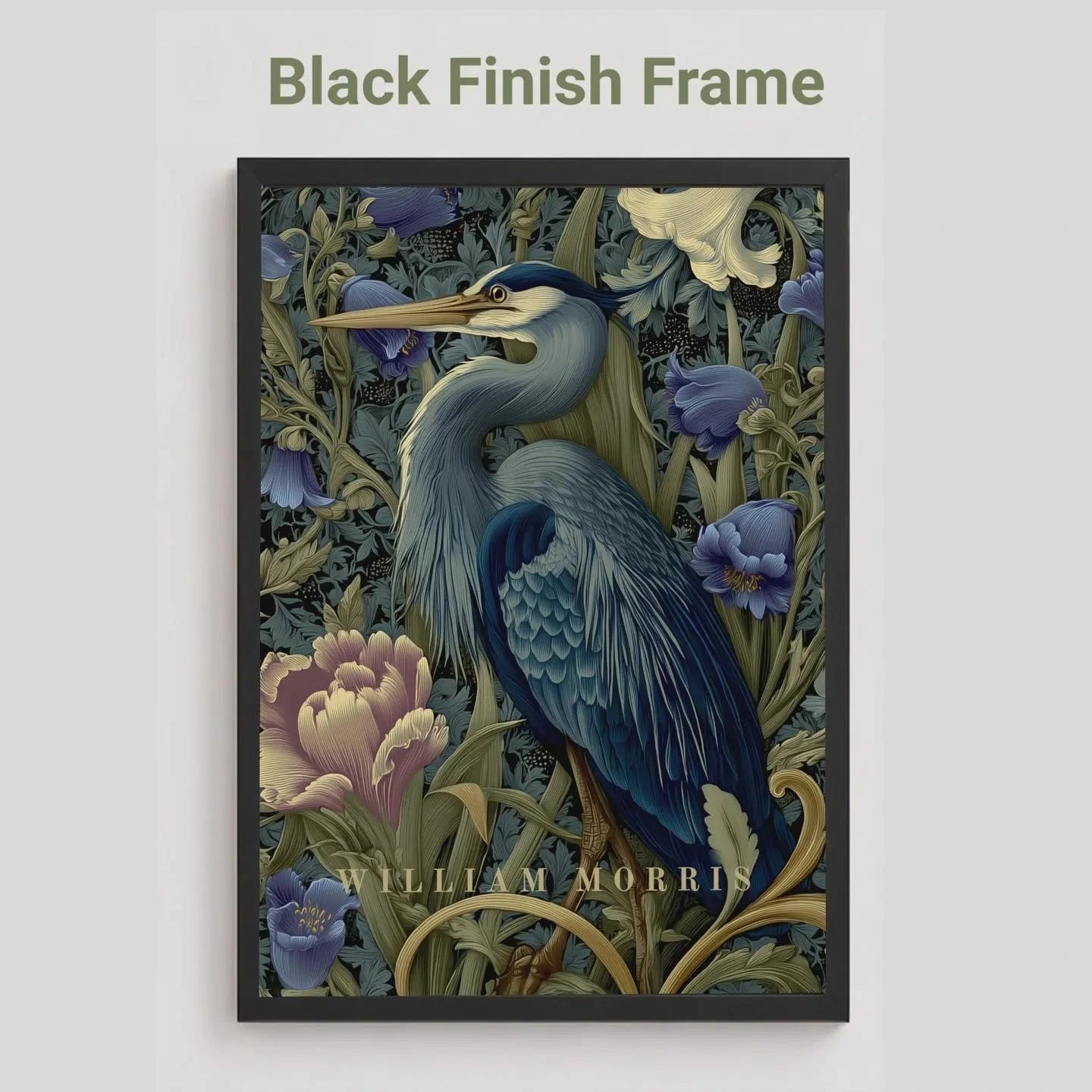 Decorative print with a blue heron and floral elements in a black frame on a light gray background. Blue heron among peonies and campanula in Victorian Arts & Crafts botanical style — dark teal, navy and olive art print
