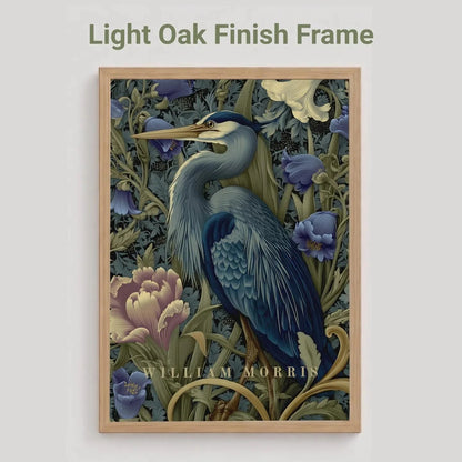 Oak Framed artwork with a blue heron and floral design on a light gray background. Blue heron among peonies and campanula in Victorian Arts & Crafts botanical style — dark teal, navy and olive art print