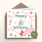 Birthday card with cake illustration and envelope on a white background