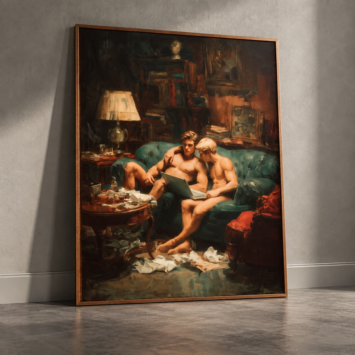 A large framed canvas print leaning against a gray wall on a concrete floor. The artwork depicts a dimly lit, cluttered room with two shirtless men sitting on a teal couch, which is a classic oil painting style.