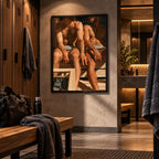A framed art print depicting two muscular men sitting on a bench, displayed on a textured concrete wall in a modern, dimly lit locker room with wooden lockers and benches.