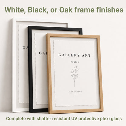Three framed gallery art posters with white, black, and oak frames on a light background.