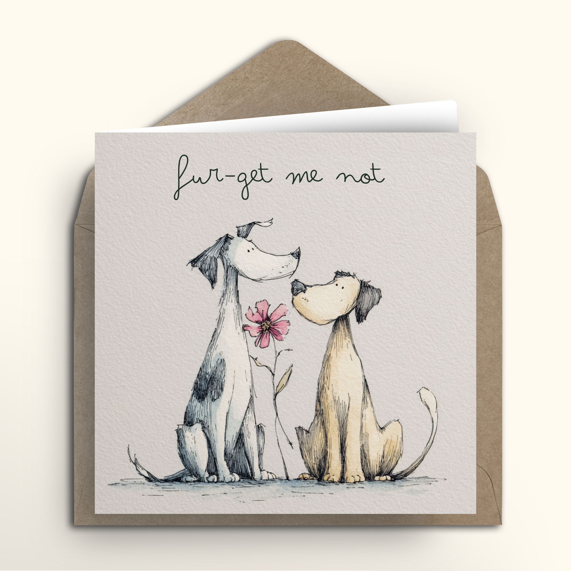 Card with two dogs holding a flower and the text 'fur-get me not' on a beige envelope.