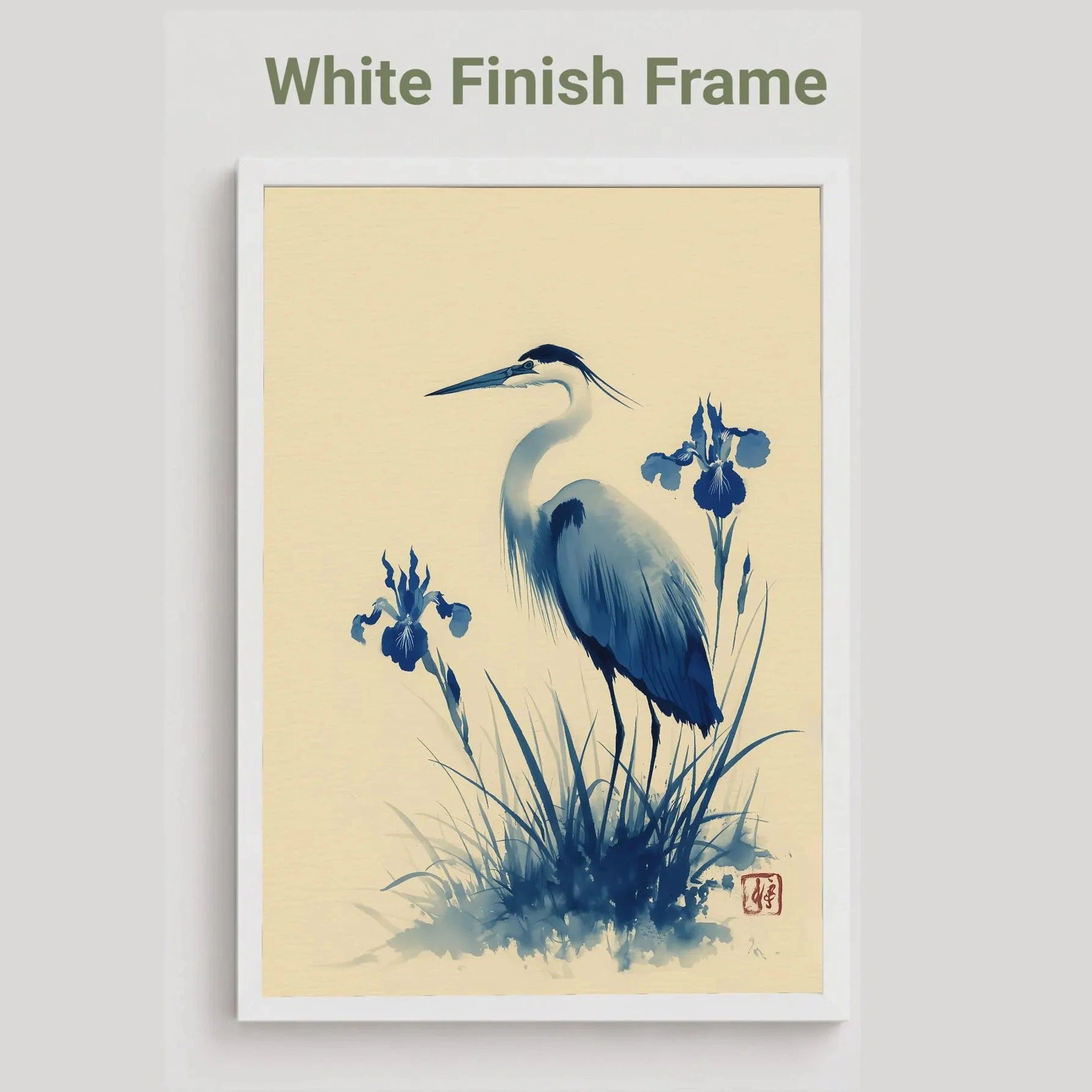 white Framed artwork of a blue heron and flowers on a beige background. Blue heron and water iris sumi-e print in indigo and cream — Japanese watercolour wall art with cinnabar seal