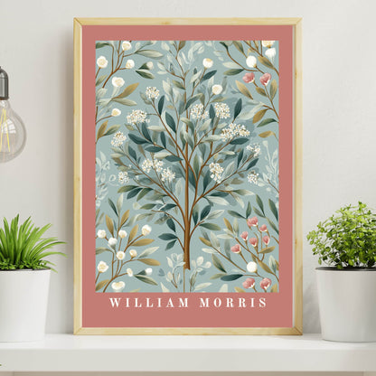 Framed artwork with floral design and 'William Morris' text on a shelf with plants.