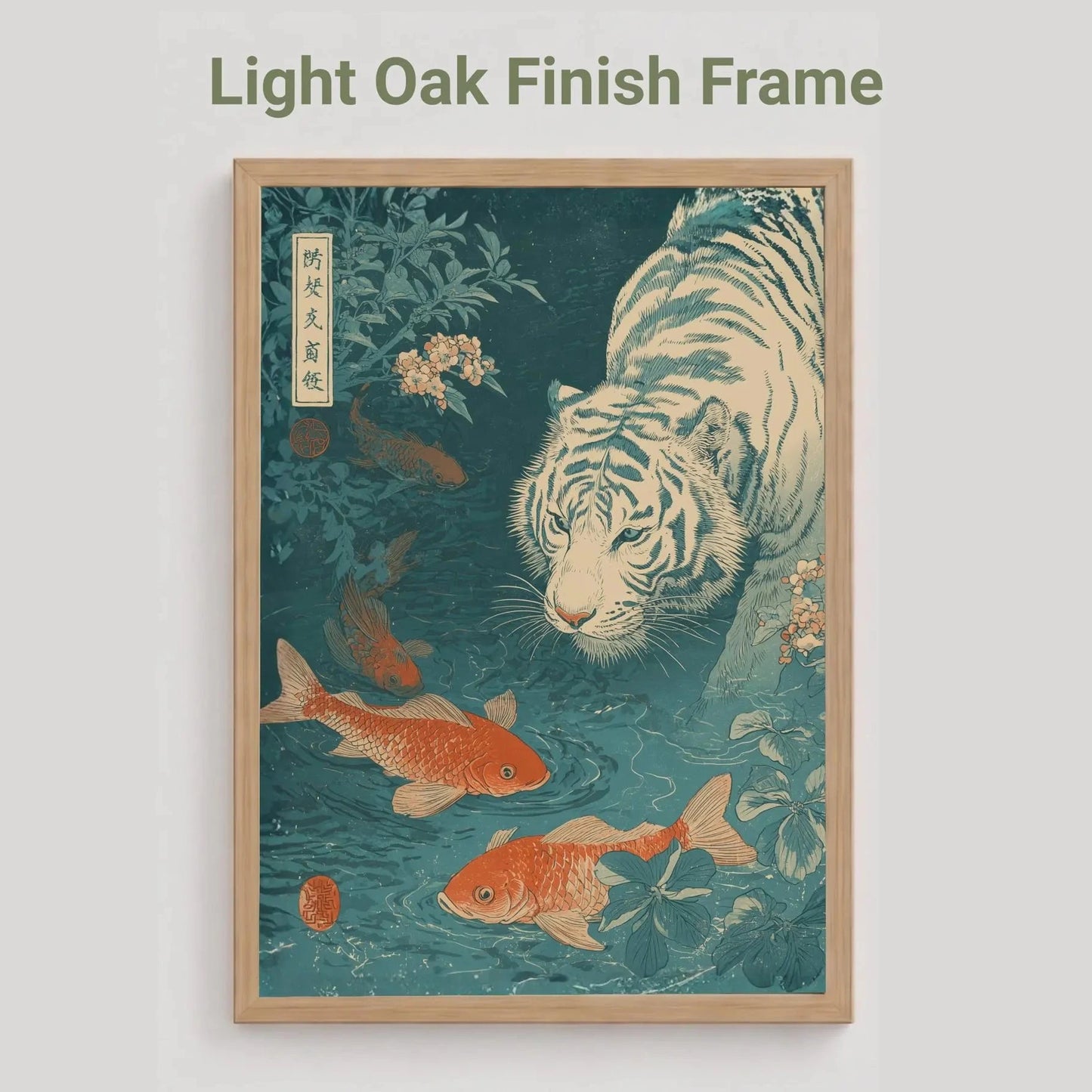 light oak Framed artwork with a tiger and goldfish design on a light gray background. Japanese woodblock-style art print of a white tiger gazing into a teal koi pond, with three orange koi fish swimming in the foreground, cherry blossoms, lush foliage, and traditional Japanese calligraphy seals, in a deep teal and burnt-orange palette.