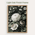 Floral artwork in a light oak finish frame on a white background