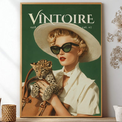 A framed vintage-style poster featuring the magazine cover 'VINTOIRE 1948 vol. 07' with a woman in a white hat and sunglasses holding a leopard, displayed on a shelf with dried flowers and decorative vases. Retro leopard wall art poster: 1950s woman in cat-eye sunglasses holding a leopard cub, green vintage print for maximalist decor
