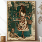 A framed art print depicting a retro-style illustration of a woman in a floral dress standing in front of a teal gelato shop, with a cheetah at her feet, displayed on a shelf in a styled room setting. Vintage, maximalist, eclectic wall art.