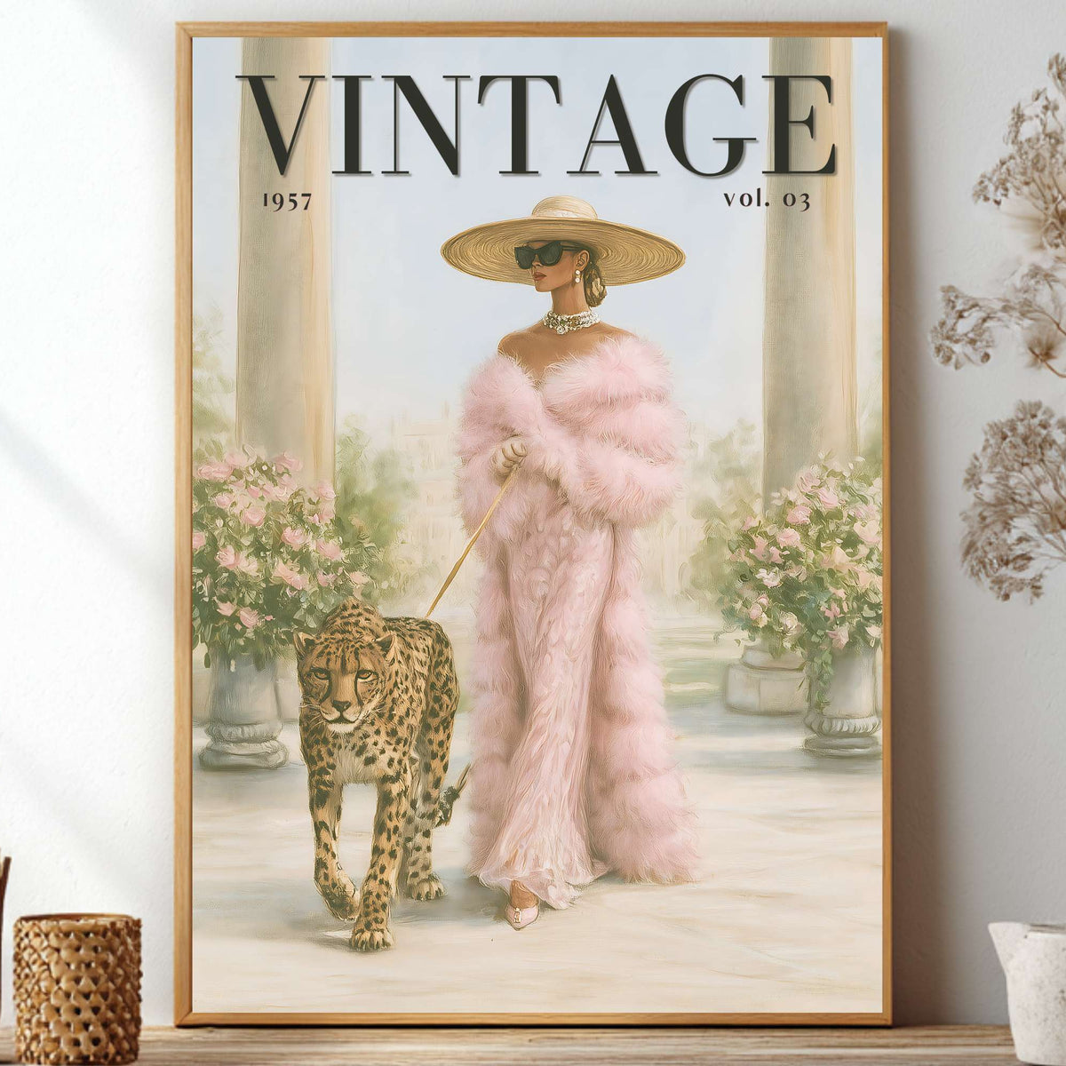 A framed vintage-style poster leaning on a shelf, showing a woman in a pink fur coat and wide-brim hat walking a leopard in a garden. The poster reads “VINTAGE 1957 vol.