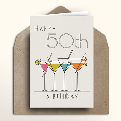 Happy 50th birthday card with cocktail illustration on a brown envelope