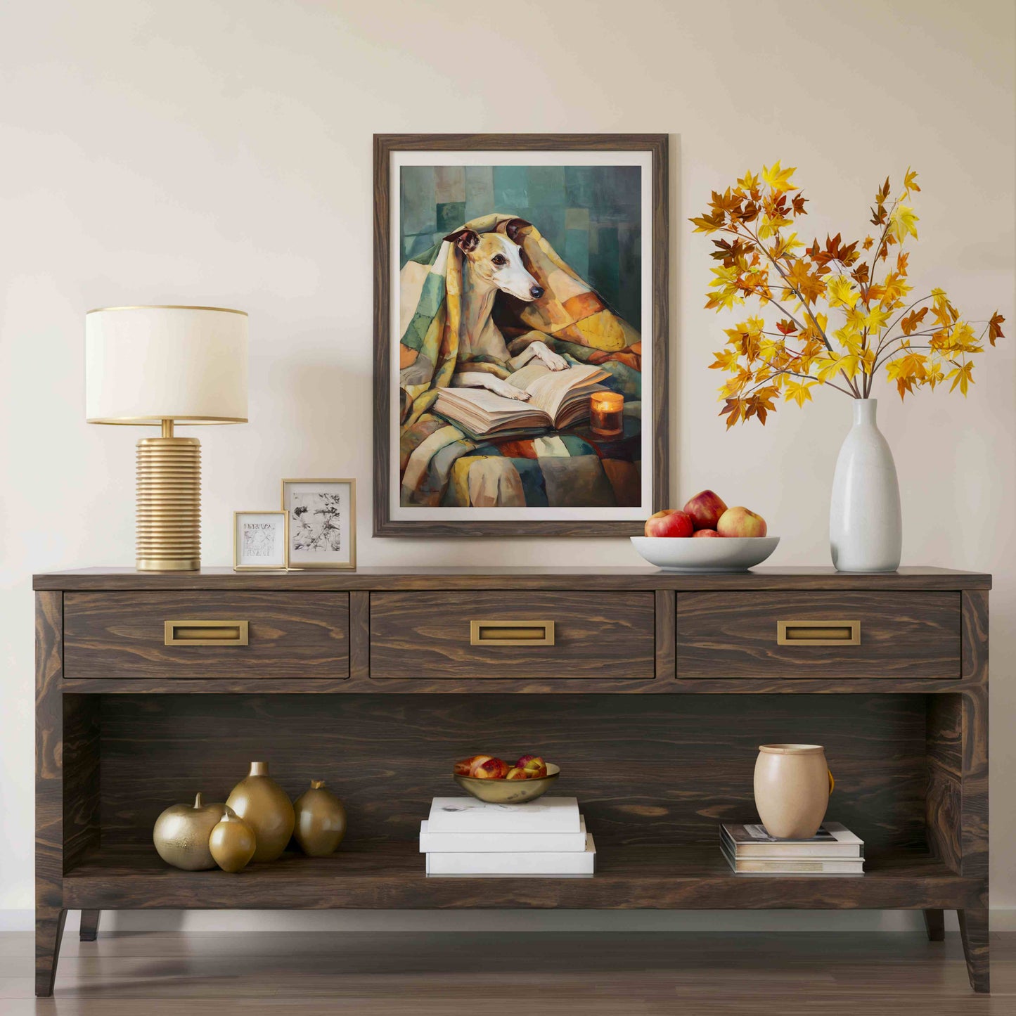 A dark wood console table styled in a living room setting, featuring a framed painting of a dog reading, a table lamp, decorative vases, and fruit bowls.