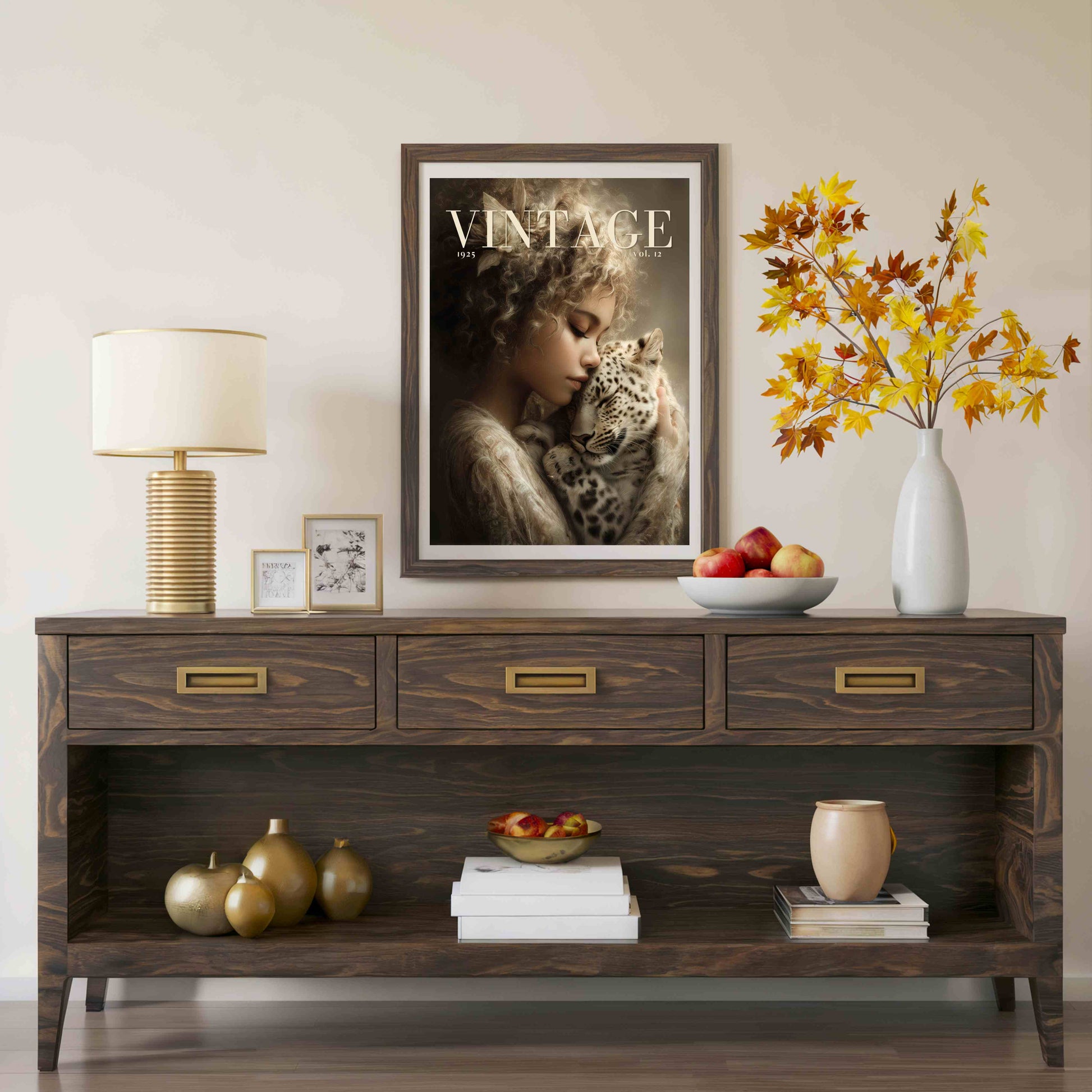 A framed vintage-style art print featuring a woman and a leopard with the word 'VINTAGE' is displayed on a dark wood console table in a styled room setting.