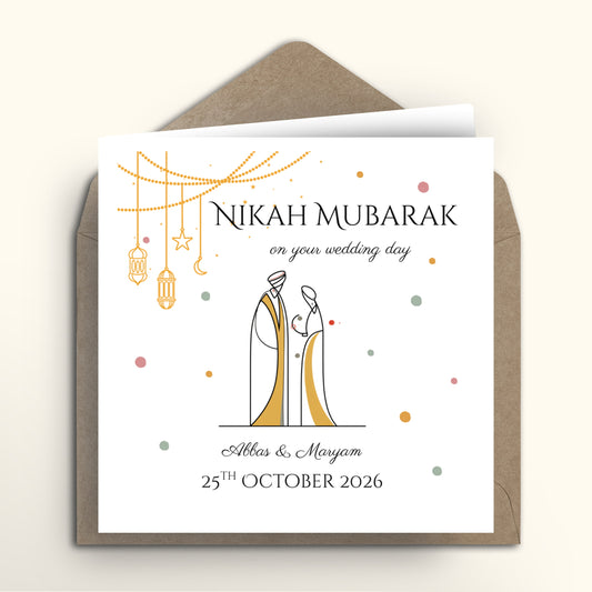 Wedding card with 'Nikah Mubarak' text and couple illustration on a white background with brown envelope.