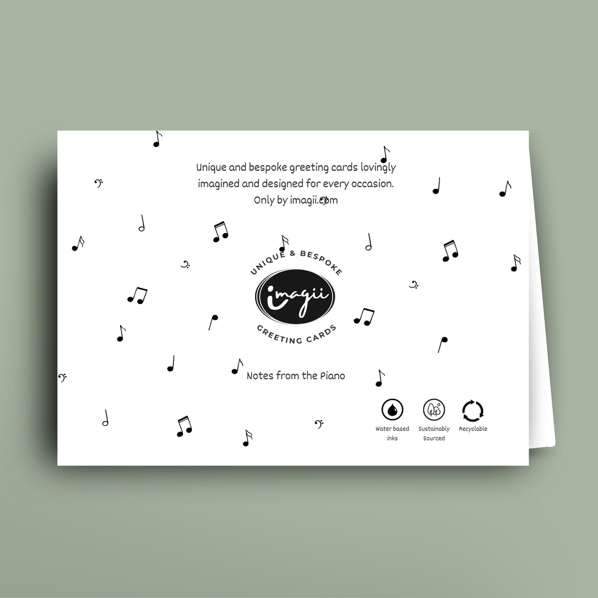 Greeting card with music notes and Imagii branding on a light green background