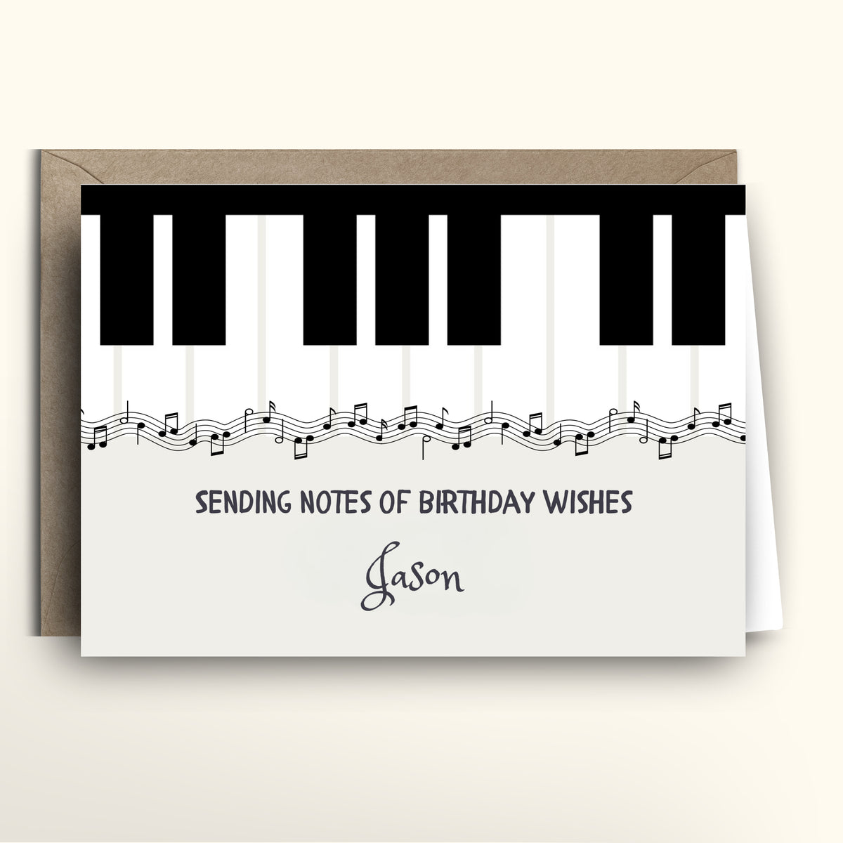 Piano key design birthday card with musical notes and personalized name on a white background