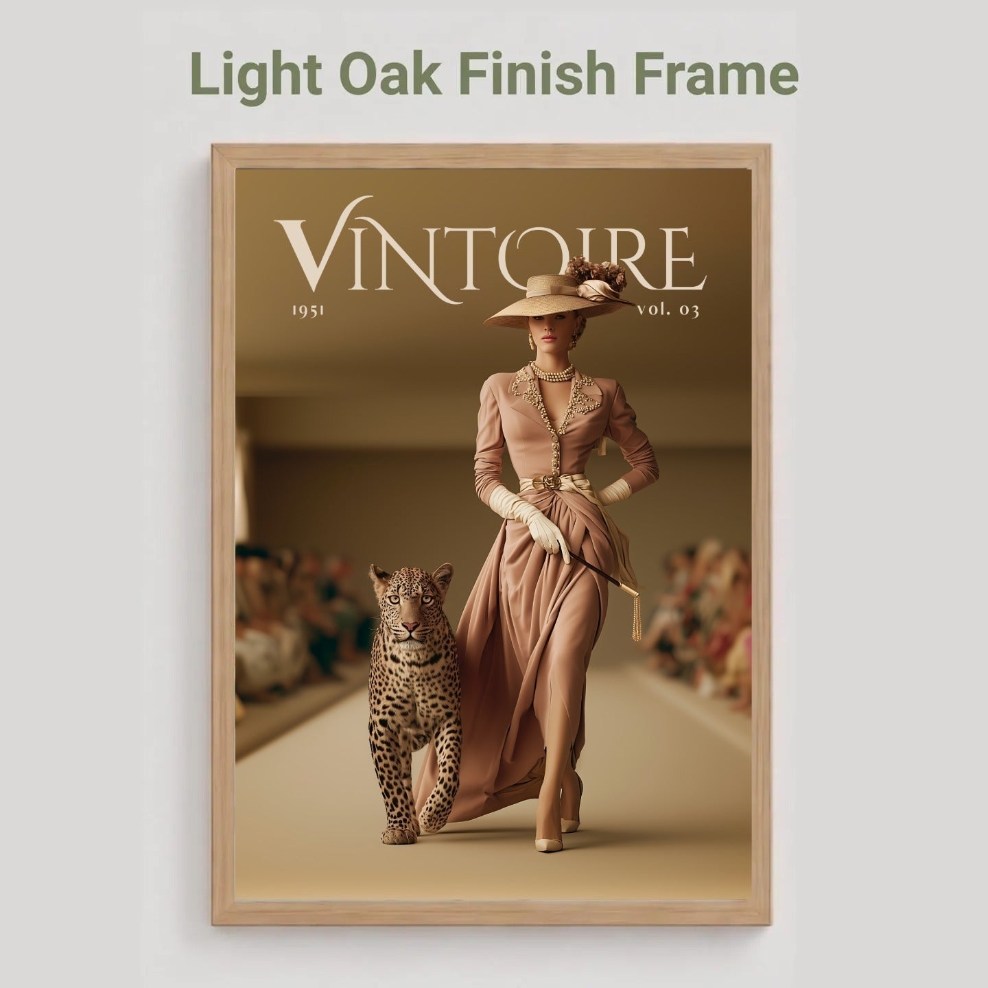 A framed art print featuring a vintage fashion magazine cover titled 'VINTOIRE 1931 vol. 82' with a woman walking with a leopard, shown in a light oak finish frame against a light gray background with the text 'Light Oak Finish Frame' above it.