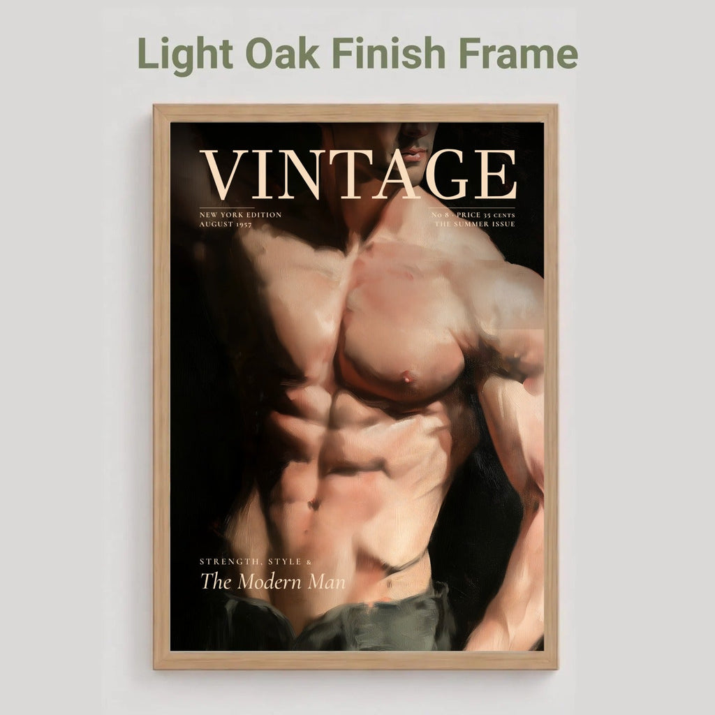 A framed poster featuring a vintage-style cover illustration of a muscular man with the word 'VINTAGE' at the top, shown hanging against a light gray wall. Text above reads 'Light Oak Finish Frame.