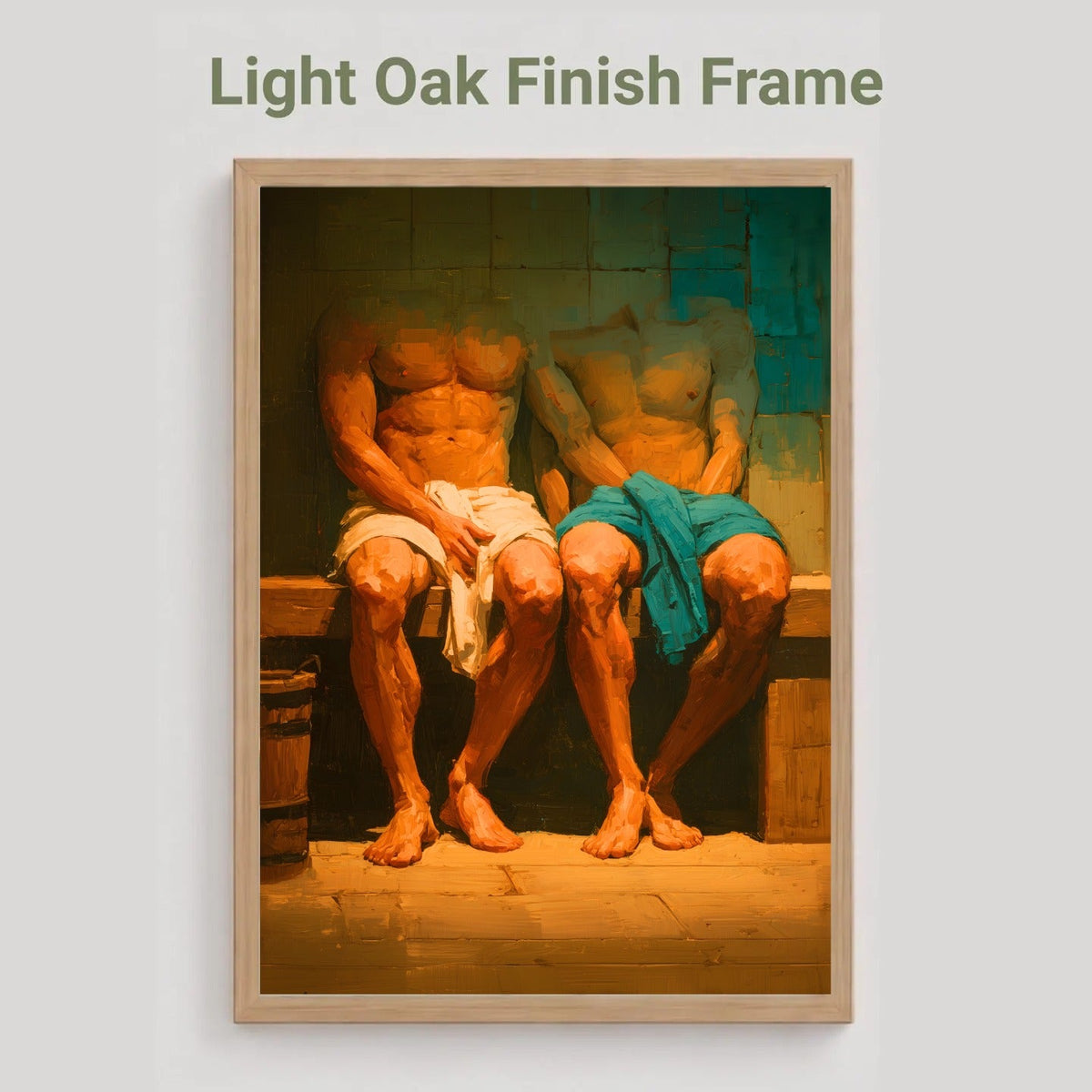 A framed art print featuring a warm-toned painting of two seated muscular men wrapped in white and teal towels, displayed in a light oak finish frame against a light gray background with the text 'Light Oak Finish Frame' above.