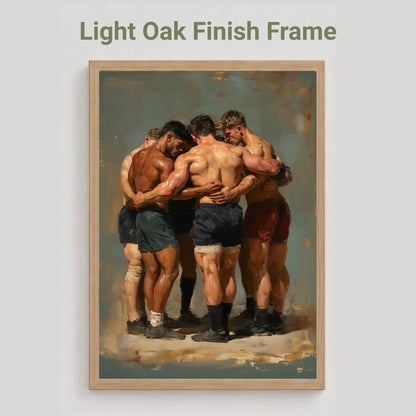 A framed art print featuring a classical painting of four rugby players huddled together, set in a light oak finish frame. The text 'Light Oak Finish Frame' is displayed above the frame against a neutral light gray background.
