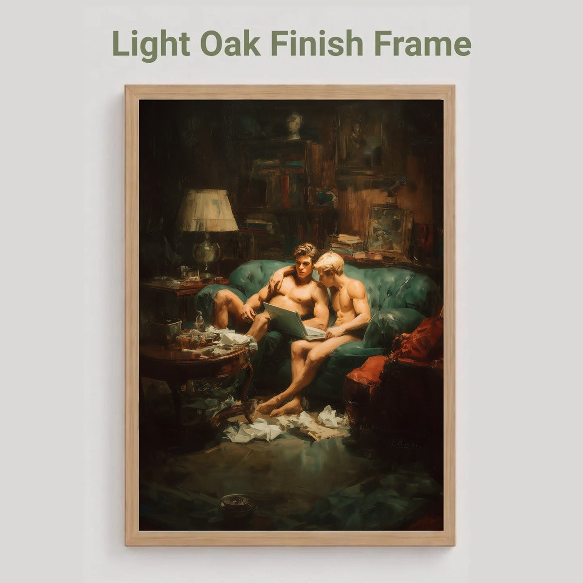 A framed art print featuring a classical painting of two men sitting on a green sofa in a dimly lit room, displayed on a light gray background with the text 'Light Oak Finish Frame' above it.