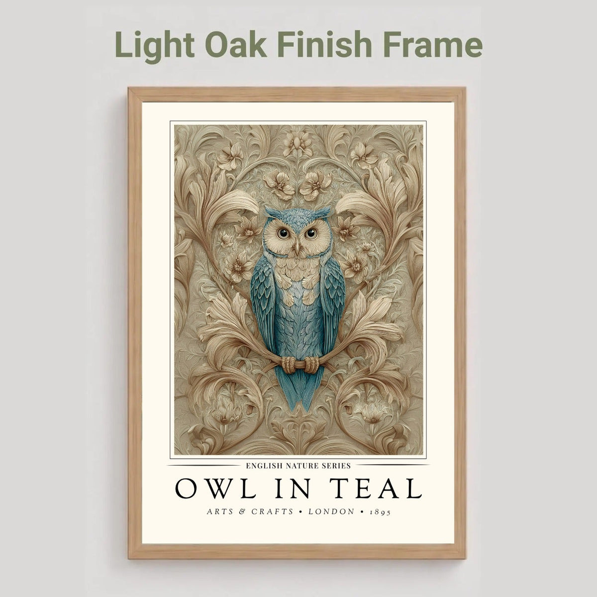 A framed art print featuring a blue owl perched among ornate beige floral motifs, shown against a light gray background with the text 'Light Oak Finish Frame' above it.