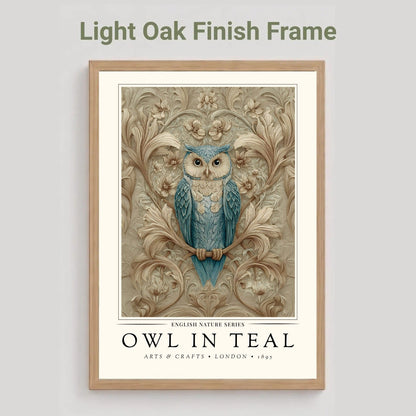 A framed art print featuring a blue owl perched among ornate beige floral motifs, shown against a light gray background with the text 'Light Oak Finish Frame' above it.