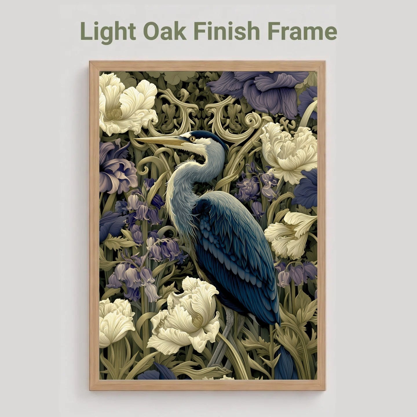 A framed art print featuring a heron surrounded by white flowers and purple foliage, displayed against a light gray background with the text 'Light Oak Finish Frame' above it.