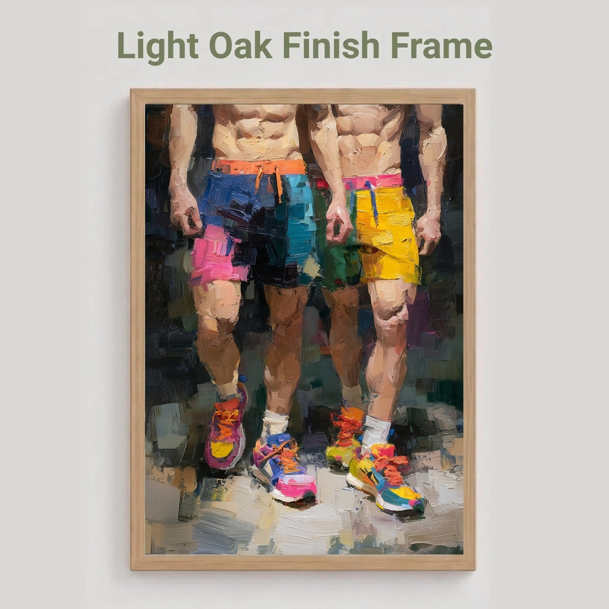 Two of a Kind gay couple print in the light oak finish frame option, two men in colourful shorts and running trainers, labelled Light Oak Finish Frame