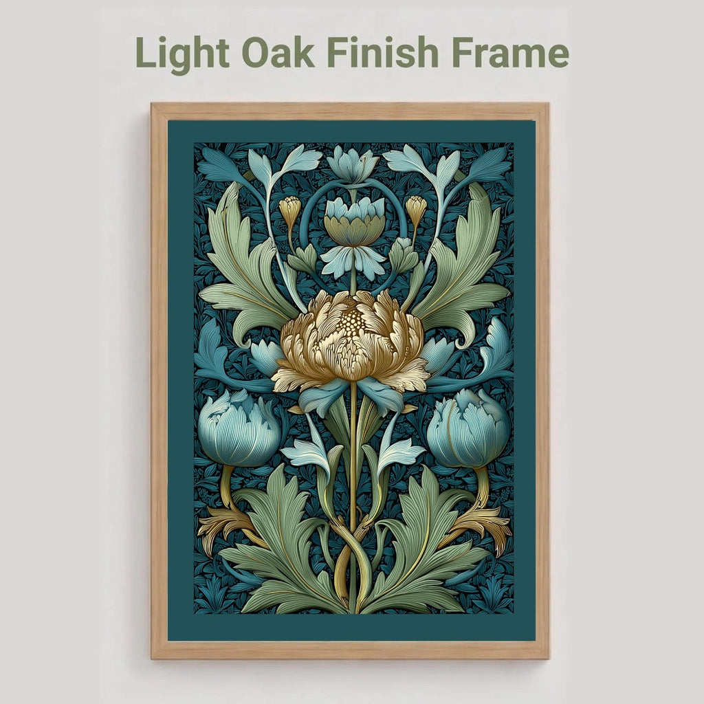 A framed floral art print with a light oak finish frame, shown against a light gray background. The print features a central cream flower with blue and green botanical leaves on a dark teal background.