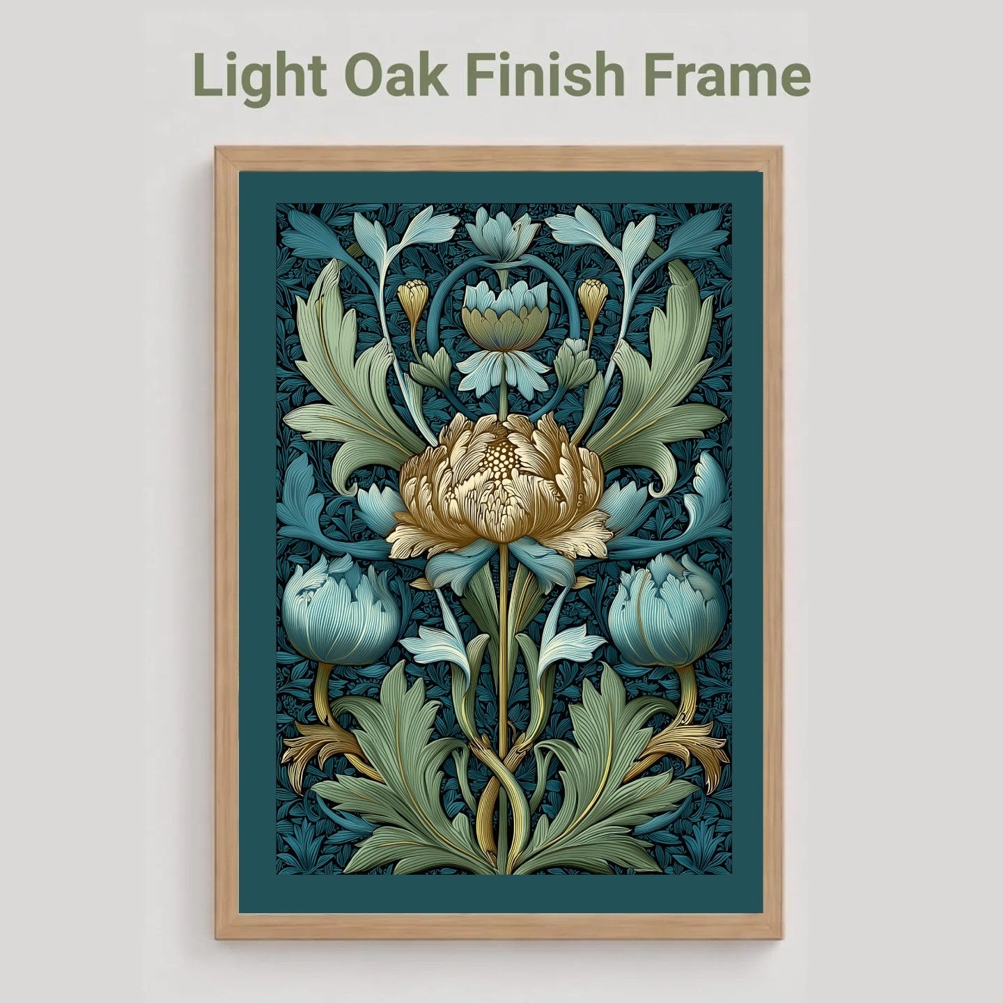 A framed floral art print with a light oak finish frame, shown against a light gray background. The print features a central cream flower with blue and green botanical leaves on a dark teal background.