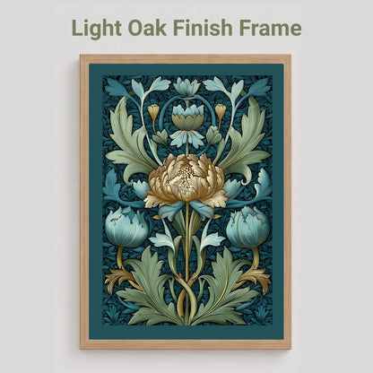A framed floral art print with a light oak finish frame, shown against a light gray background. The print features a central cream flower with blue and green botanical leaves on a dark teal background.