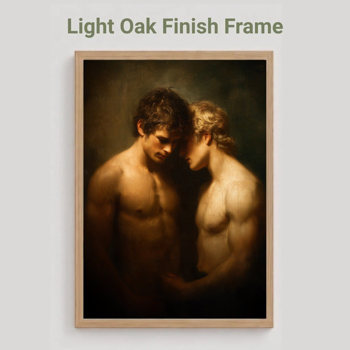 A framed art print featuring a classical painting of two shirtless men in warm brown and gold tones, shown with the text 'Light Oak Finish Frame' above it on a light gray background.
