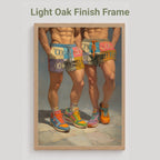 A framed art print featuring a painting of two men's lower torsos and legs wearing colorful sneakers and shorts, displayed on a light gray background with the text 'Light Oak Finish Frame' above it.