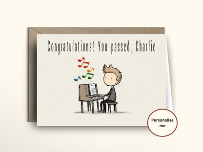 Greeting card with a cartoon illustration of a person sitting at a piano, with text 'Congratulations! You passed, Charlie'.