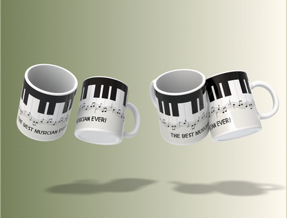 Four white mugs with black piano key and music note designs on a light green background