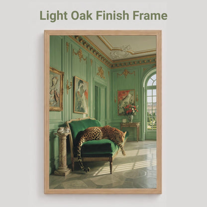 oak framed poster of a leopard as it rests draped across a green velvet chaise longe in a sun-drenched French palatial interior with sage green panelled walls, gilded gold mouldings, marble floors, and classical paintings — vintage animal art print.