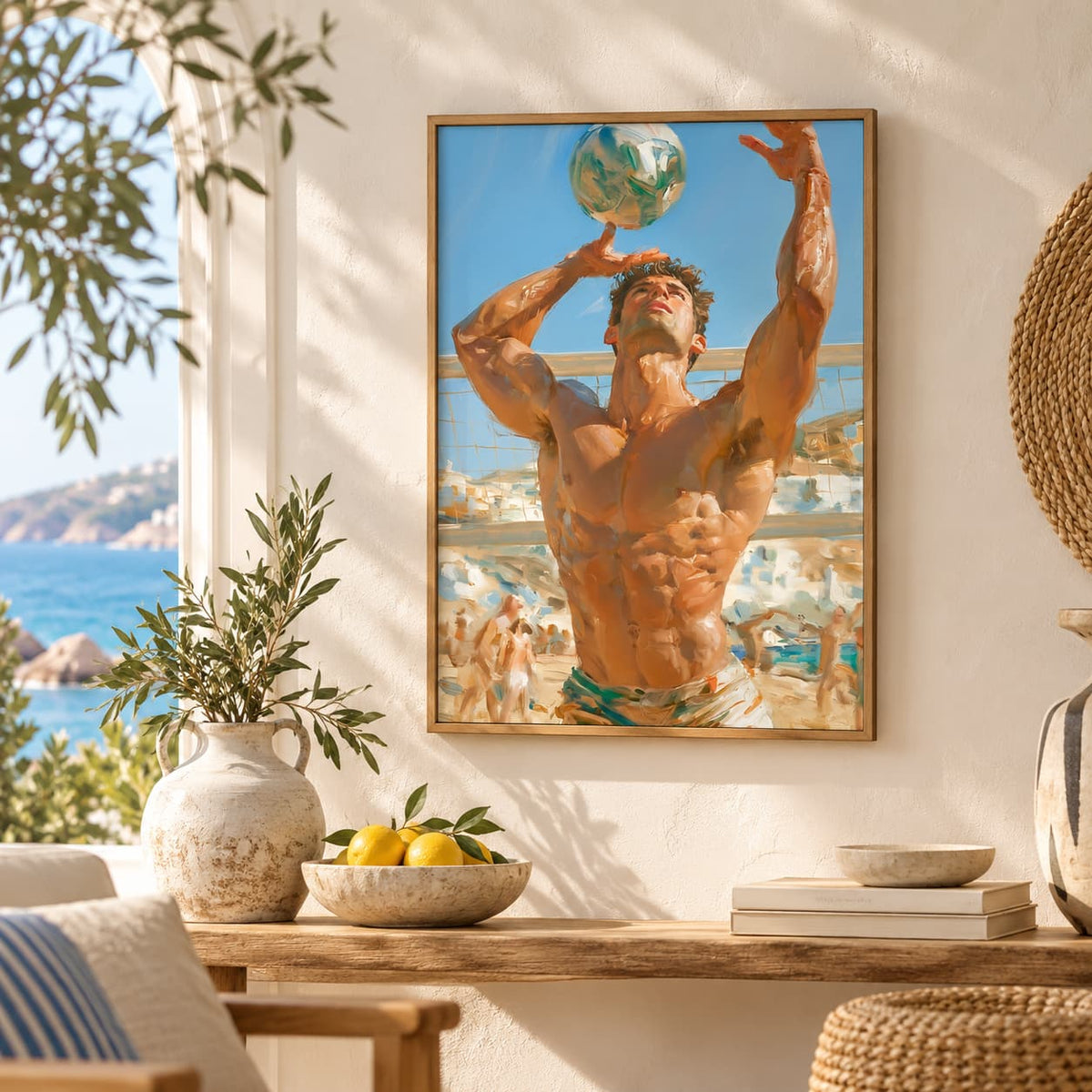 A framed art print depicting a shirtless man playing volleyball on a sunny beach, styled on a white wall above a wooden console table with a vase, lemons, and books.
